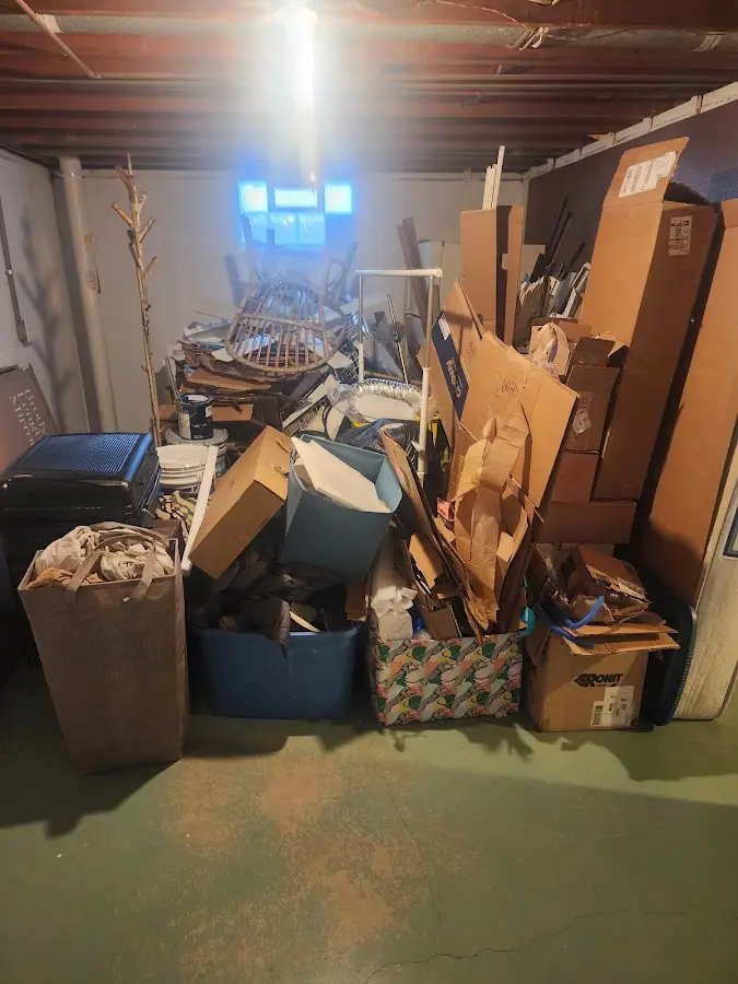 Roll-off dumpster container at job site for Concrete Dumpster Rental in Dana